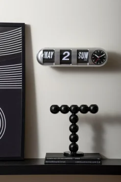 Karlsson Wandklok Tube Flip zilver