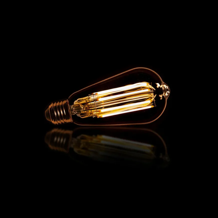 WoonStijl Lichtbron LED filament druppel - E27 6W 2100K 450lm dimbaar / Amberkleurig glas