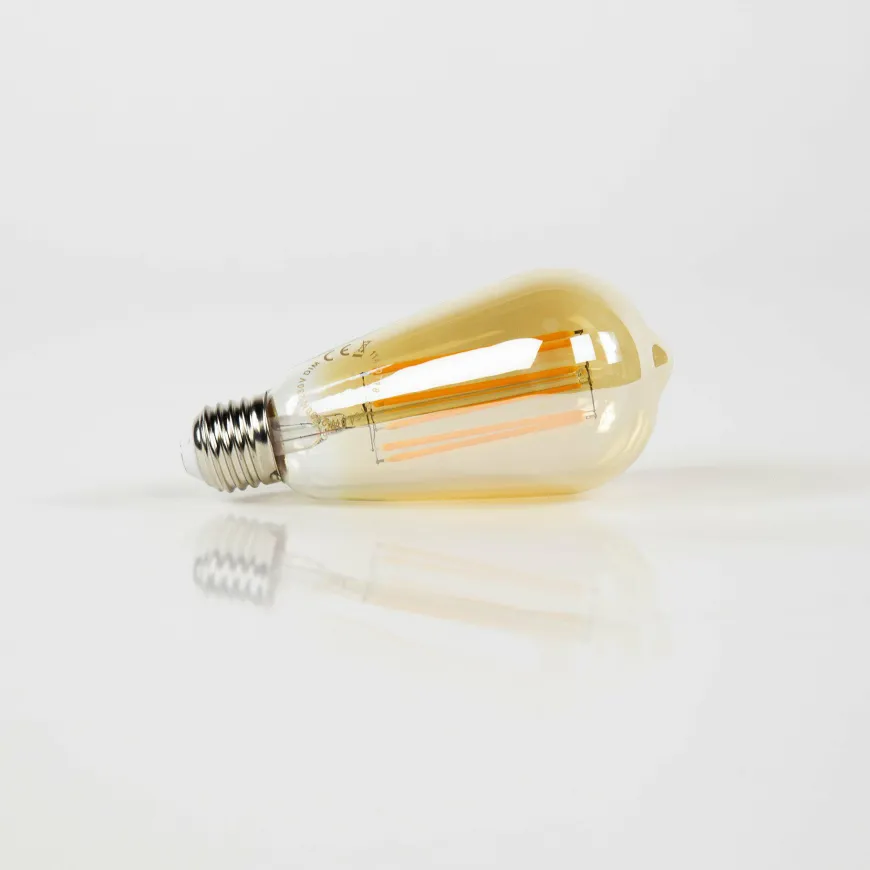 WoonStijl Lichtbron LED filament druppel - E27 6W 2100K 450lm dimbaar / Amberkleurig glas